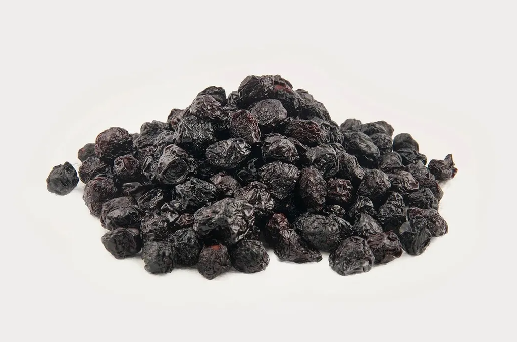 Sour Cherry (Aaloo Baloo Vaalo) dried fruit powder in bowl – natural tangy fruit ingredient